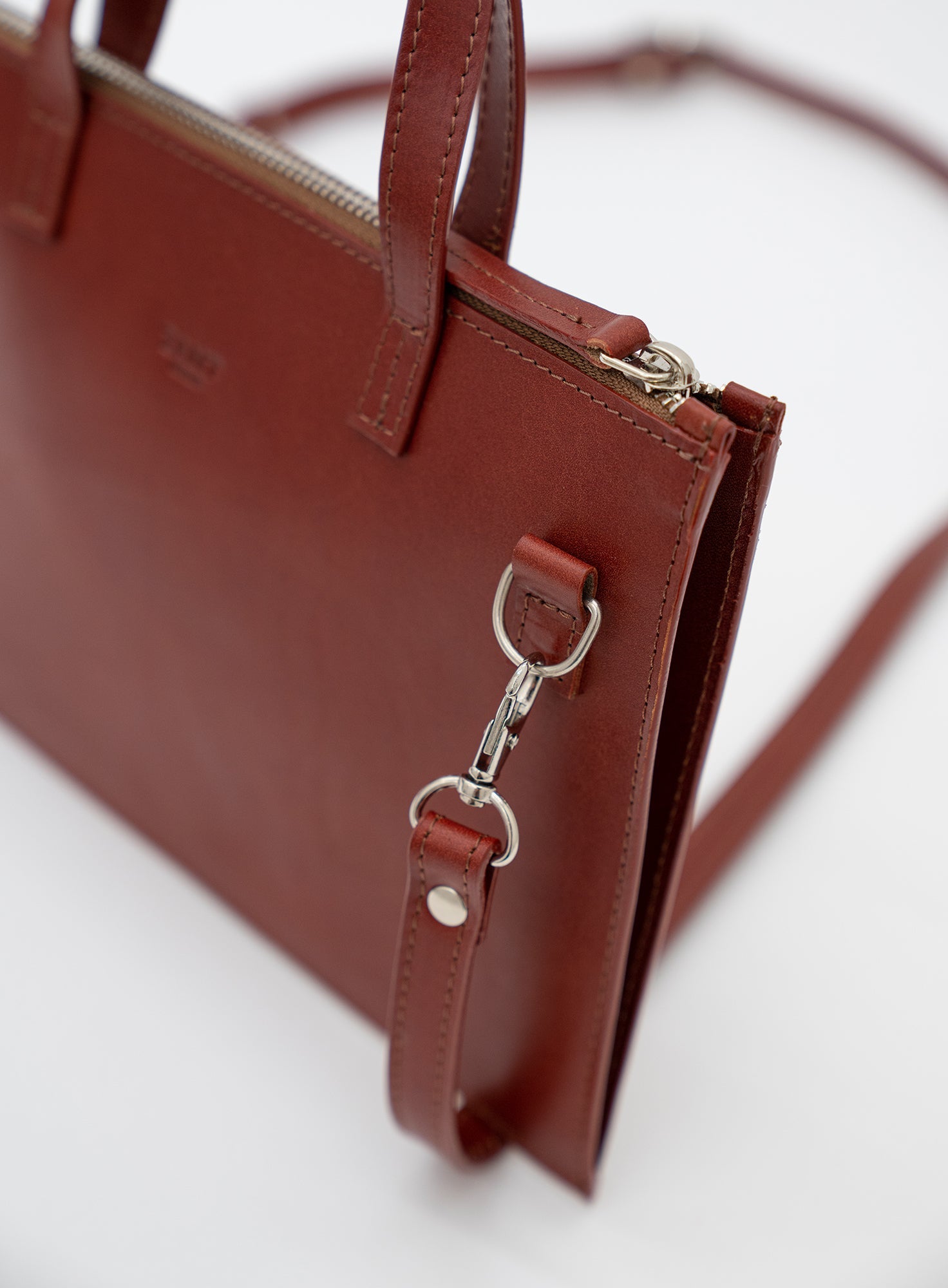 CROSSBODY_POUCH_LEYAN_COGNAC_Designed_in_Berlin_Made_to_last_Handmade_in_Poland.