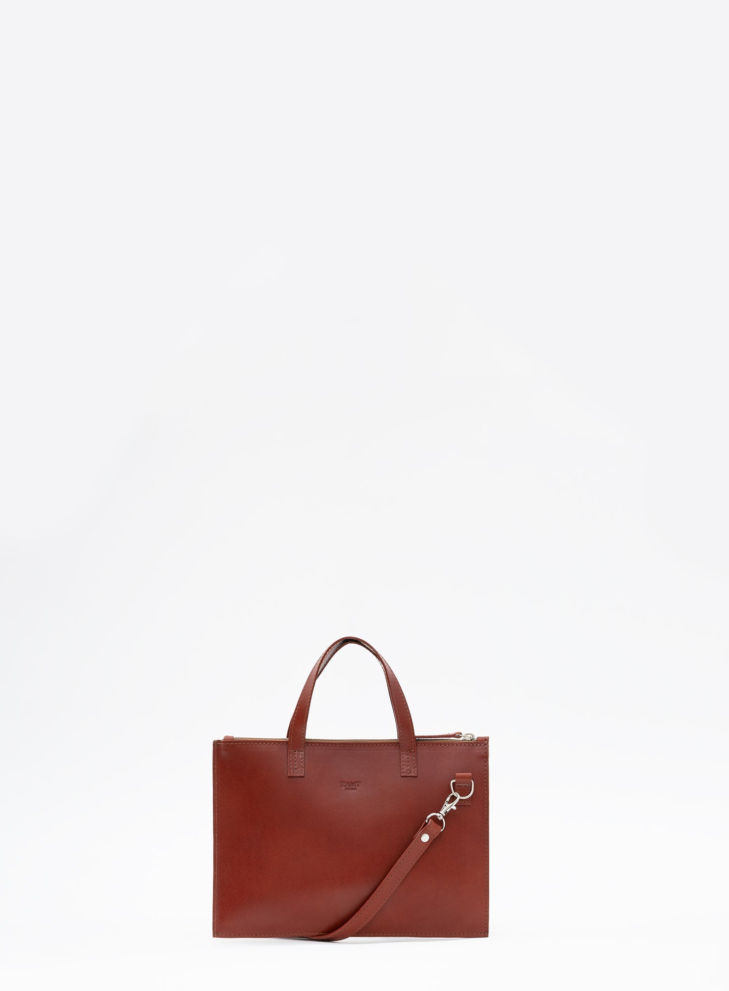 CROSSBODY_POUCH_LEYAN_COGNAC_Designed_in_Berlin_Made_to_last_Handmade_in_Poland.
