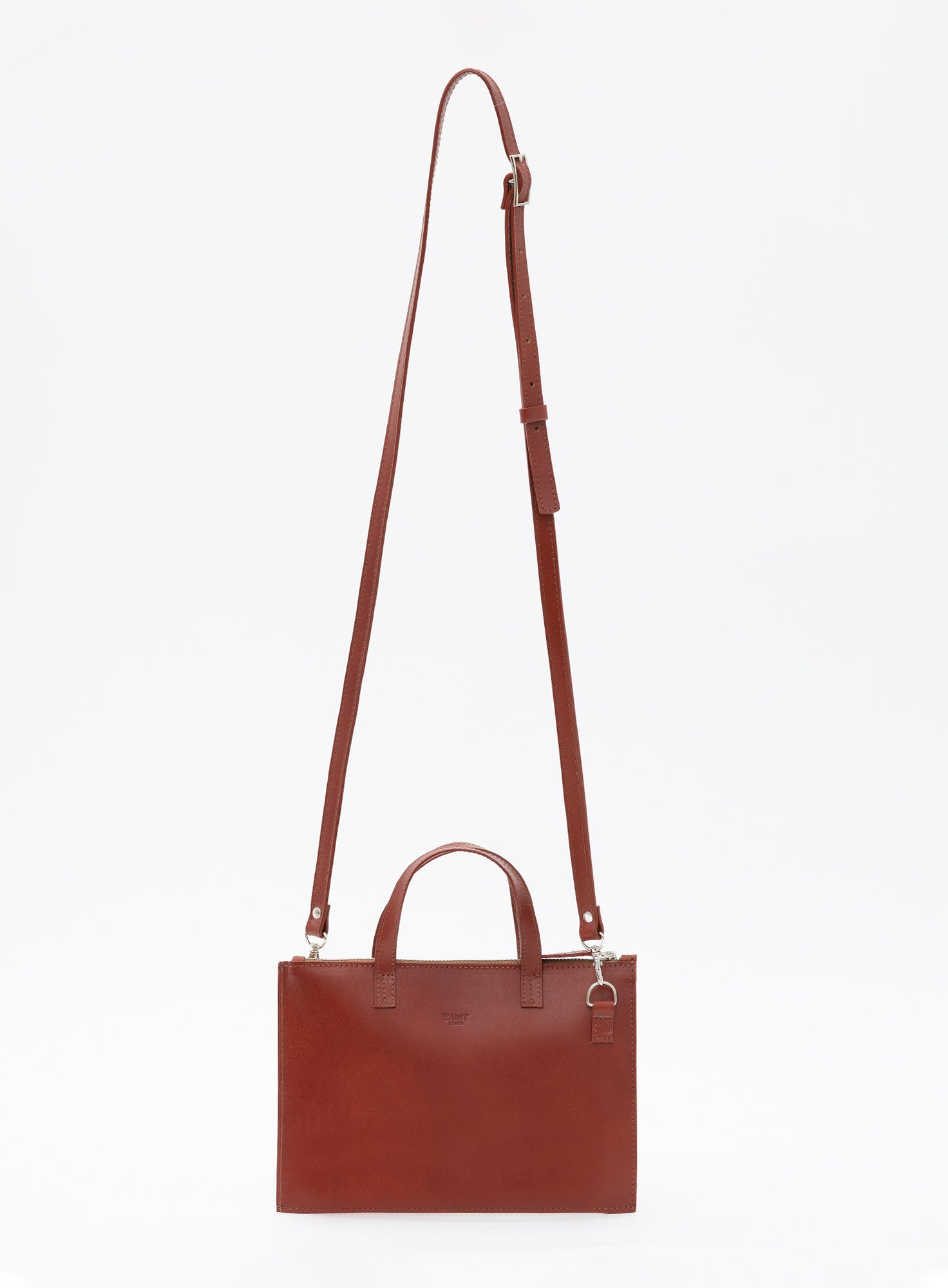 CROSSBODY_POUCH_LEYAN_COGNAC_Designed_in_Berlin_Made_to_last_Handmade_in_Poland.