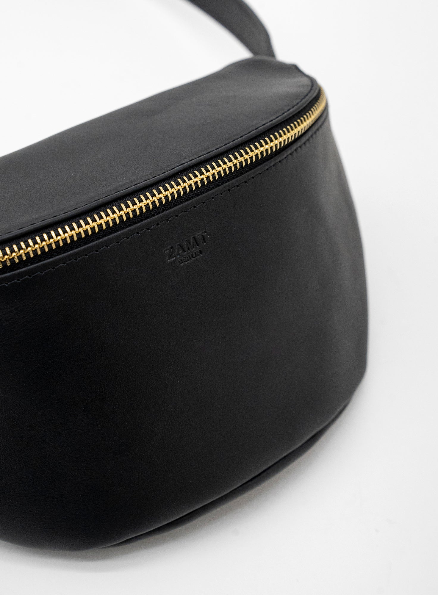 Black and gold bum bag shop