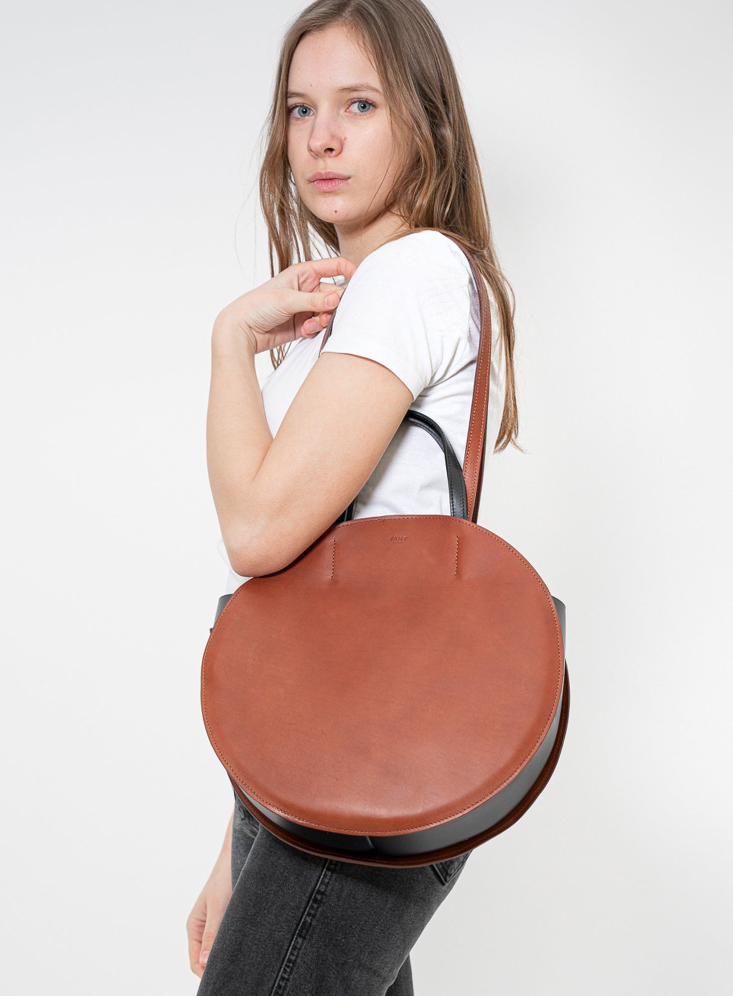 ROUND_Bag_Myra_COGNAC_Designed_in_Berlin_Made_to_last_Handmade_in_Portugal.